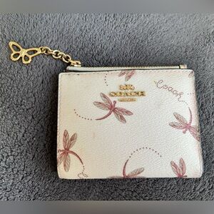 Dragonfly Coach wallet with butterfly zipper charm